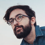 Photo of a young man with glasses